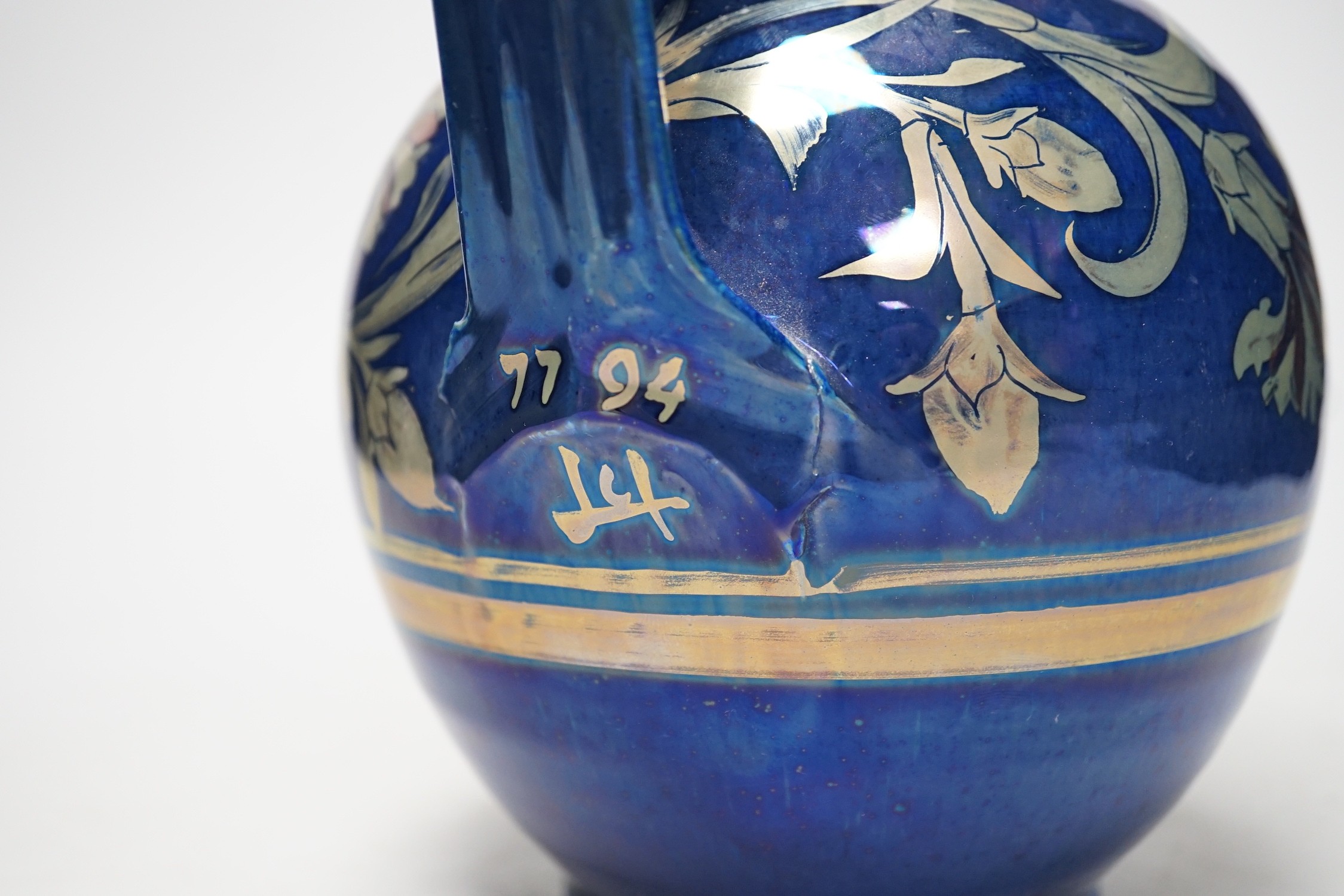 Jonathan Chiswell Jones - a ‘chrysanthemum’ pattern lustre jug, No. 7794, 23cm
